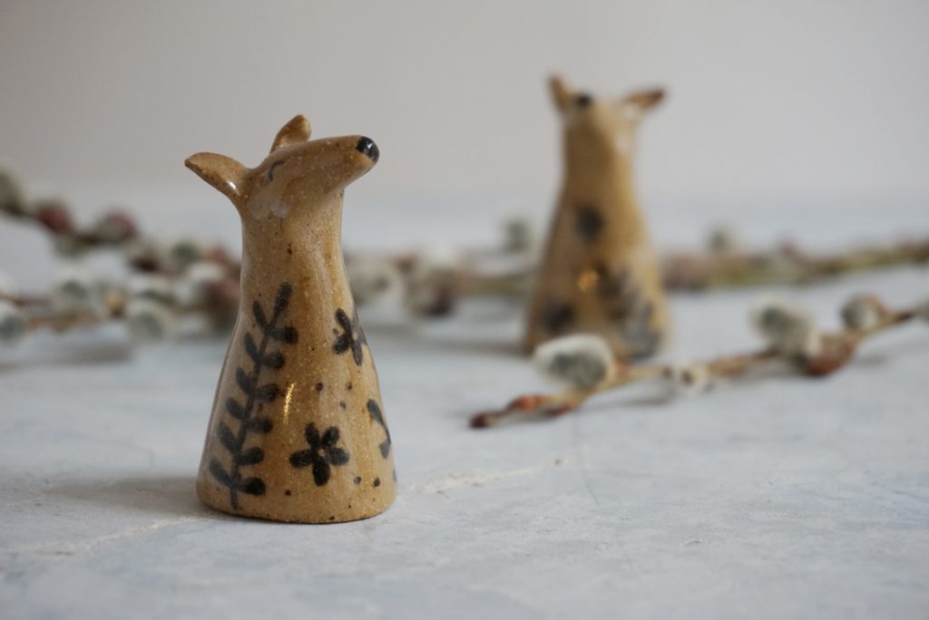 two ceramic dog figurines