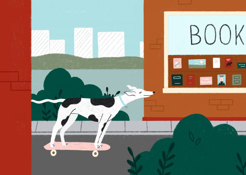 A greyhound skateboards past a book store